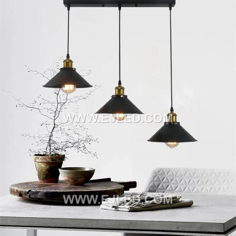 The MK0154 is a striking triple-lamp pendant, featuring a wide aluminum dome in an antique brass finish. It provides broad, even illumination downwards, ideal for spaces requiring ample task or ambient light. - view 2