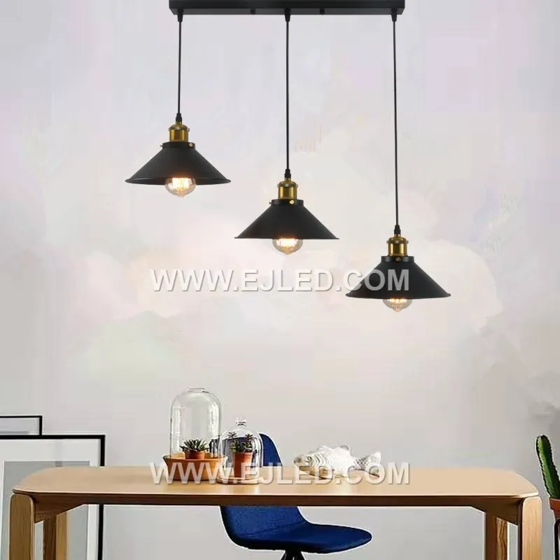 The MK0154 is a striking triple-lamp pendant, featuring a wide aluminum dome in an antique brass finish. It provides broad, even illumination downwards, ideal for spaces requiring ample task or ambient light. - view 3