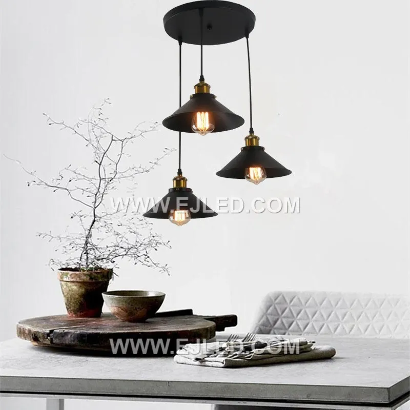 Coated in a matte black finish, the MK0155 is an iron cone pendant housing three E27 lamps in a linear arrangement. This fixture provides focused, direct illumination, suitable for narrower or longer spaces. - view 3