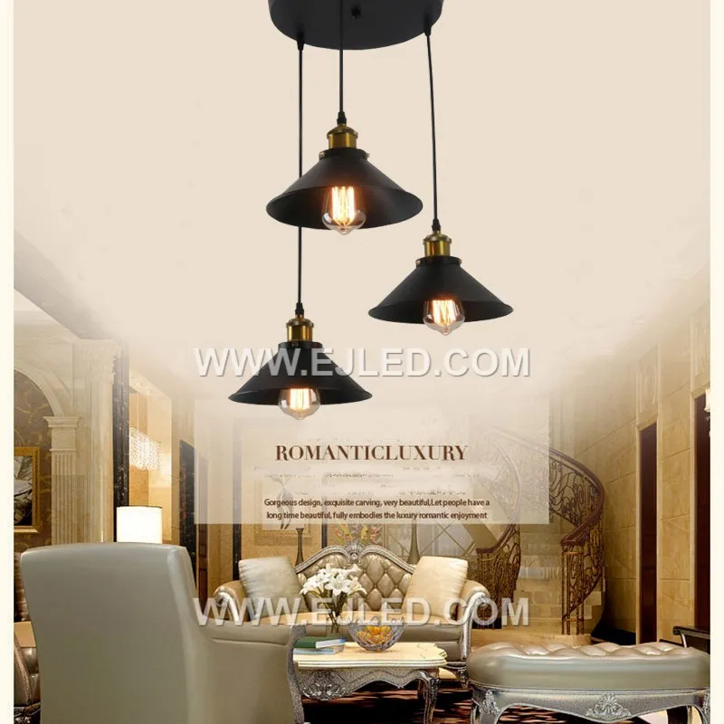 Coated in a matte black finish, the MK0155 is an iron cone pendant housing three E27 lamps in a linear arrangement. This fixture provides focused, direct illumination, suitable for narrower or longer spaces. - view 5