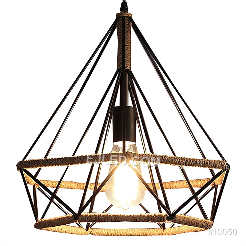 The black-finished brass construction of the IN0050 pyramid pendant light supports an exposed bulb within its open cage. A decorative hemp rope detail completes this single fixture, ideal for specific design schemes.