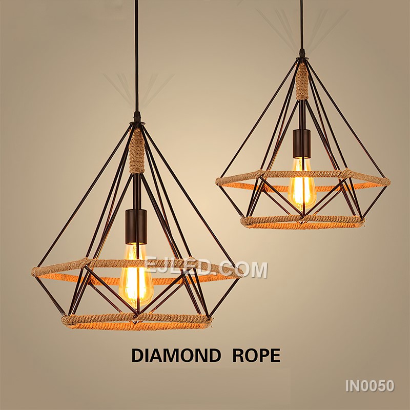 The black-finished brass construction of the IN0050 pyramid pendant light supports an exposed bulb within its open cage. A decorative hemp rope detail completes this single fixture, ideal for specific design schemes. - view 2