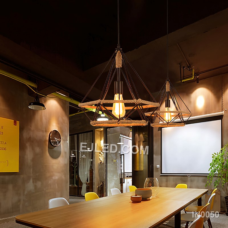 The black-finished brass construction of the IN0050 pyramid pendant light supports an exposed bulb within its open cage. A decorative hemp rope detail completes this single fixture, ideal for specific design schemes. - view 4