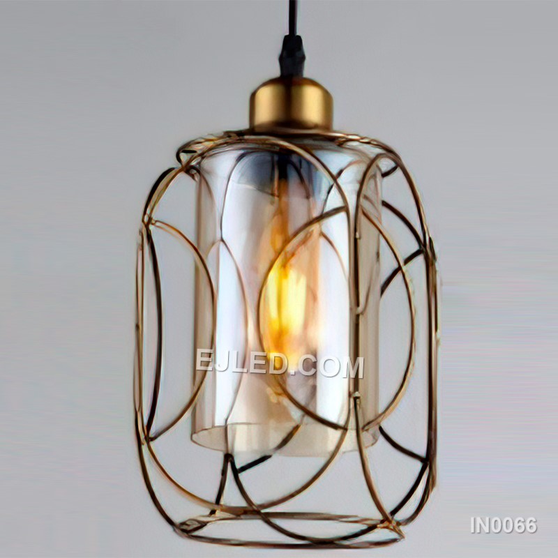 This slender gold-finished brass pendant light, featuring a clear cylindrical glass shade and a single lamp, adds a bright focus above kitchen islands, bars, or in compact settings where height is a feature. - view 2