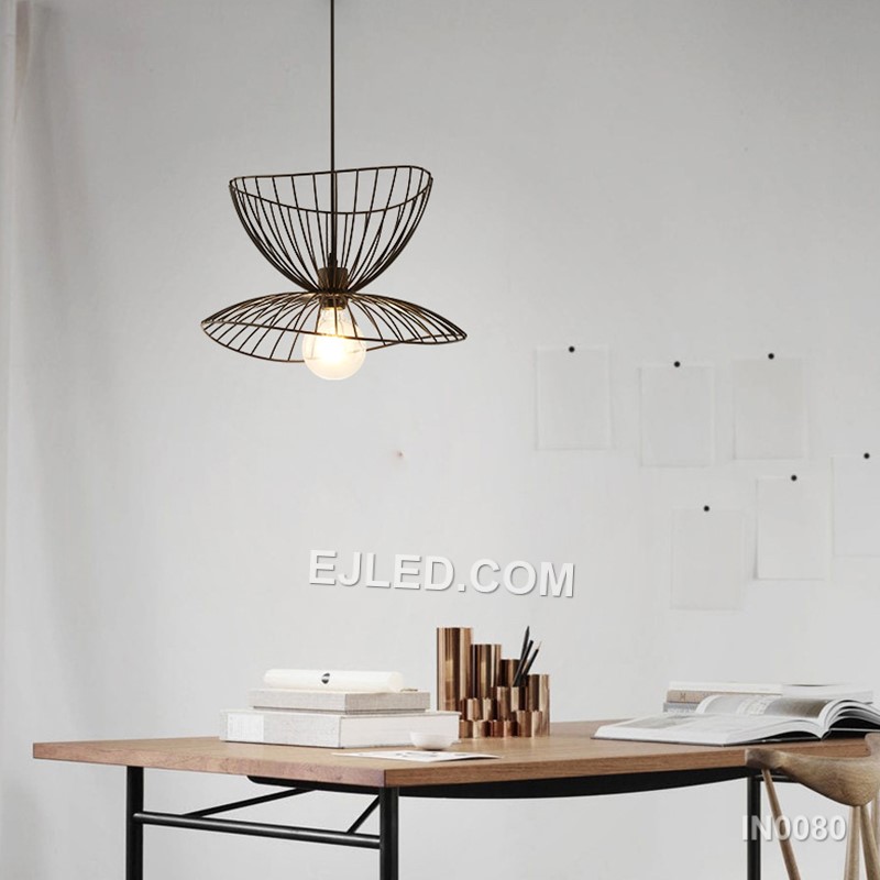 Layered black iron petals form the distinctive shade of the IN0080 Iron Pendant Light, encircling a single lamp. This open, sculptural design casts diffuse light and creates unique shadow patterns. - view 2