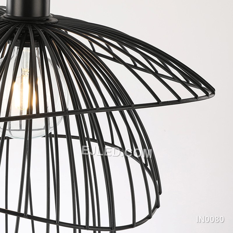 Layered black iron petals form the distinctive shade of the IN0080 Iron Pendant Light, encircling a single lamp. This open, sculptural design casts diffuse light and creates unique shadow patterns. - view 3