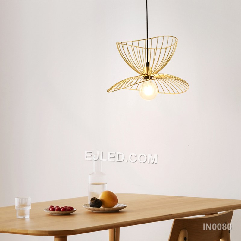 Layered black iron petals form the distinctive shade of the IN0080 Iron Pendant Light, encircling a single lamp. This open, sculptural design casts diffuse light and creates unique shadow patterns. - view 4