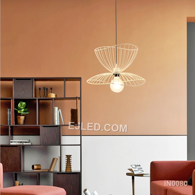Layered black iron petals form the distinctive shade of the IN0080 Iron Pendant Light, encircling a single lamp. This open, sculptural design casts diffuse light and creates unique shadow patterns. - view 5