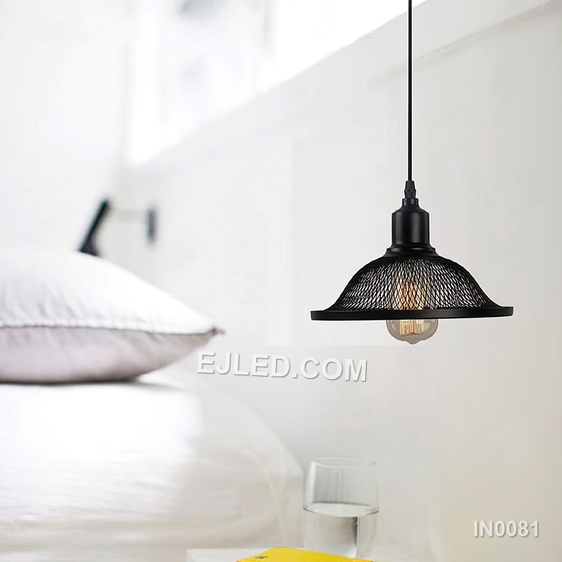 Black iron forms the clean, simple bell shape of the IN0081 pendant light, providing downward-directed illumination from a single exposed lamp. Its moderate size makes it suitable for individual accent lighting or multiple installations. - view 5