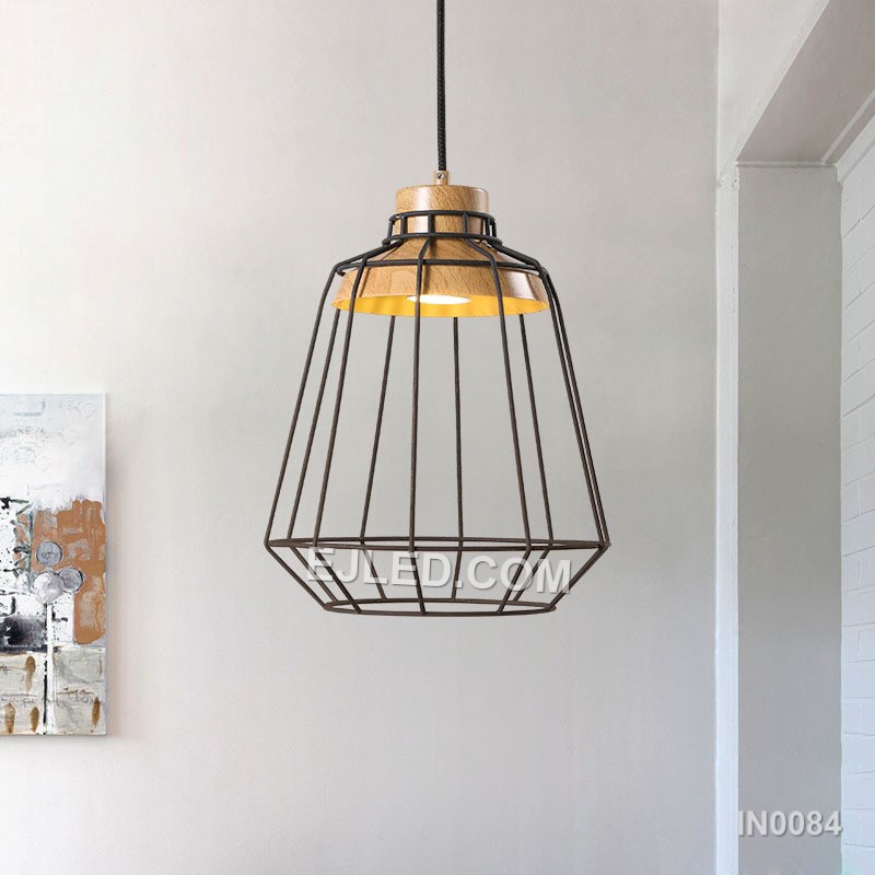 A cylindrical "birdcage" form defines the IN0084 pendant light, crafted from black metal wire and accented with natural wooden discs at the top and bottom. This open design offers ambient light with minimal obstruction. - view 2