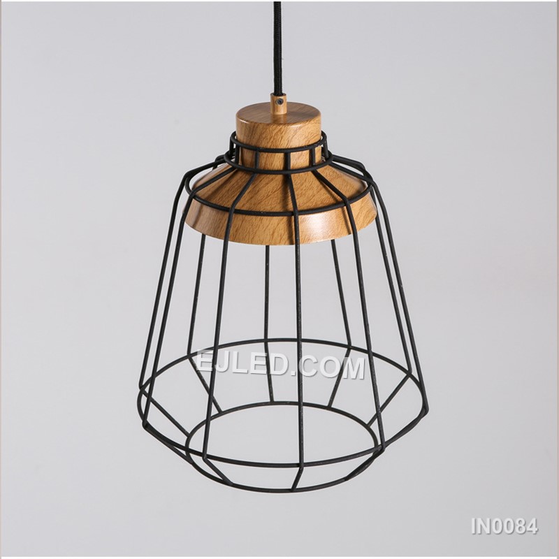 A cylindrical "birdcage" form defines the IN0084 pendant light, crafted from black metal wire and accented with natural wooden discs at the top and bottom. This open design offers ambient light with minimal obstruction. - view 4