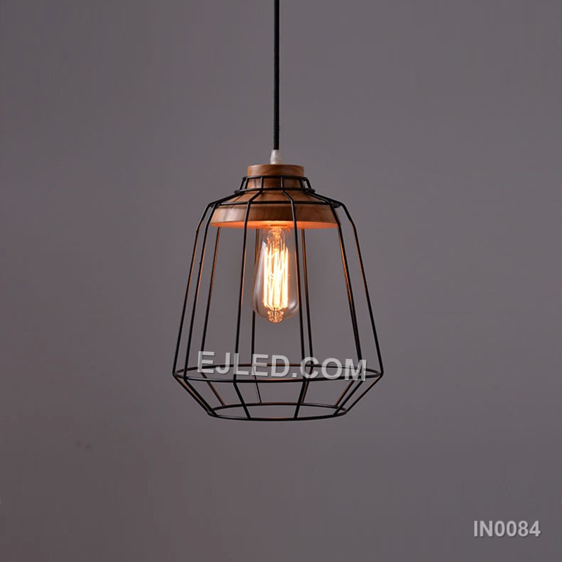 A cylindrical "birdcage" form defines the IN0084 pendant light, crafted from black metal wire and accented with natural wooden discs at the top and bottom. This open design offers ambient light with minimal obstruction. - view 6