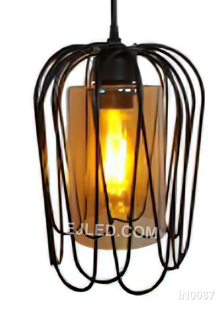 A cylindrical iron pendant, the IN0087 features a matte black cage enclosing a clear glass shade, providing glare-free, widespread illumination from a single lamp.