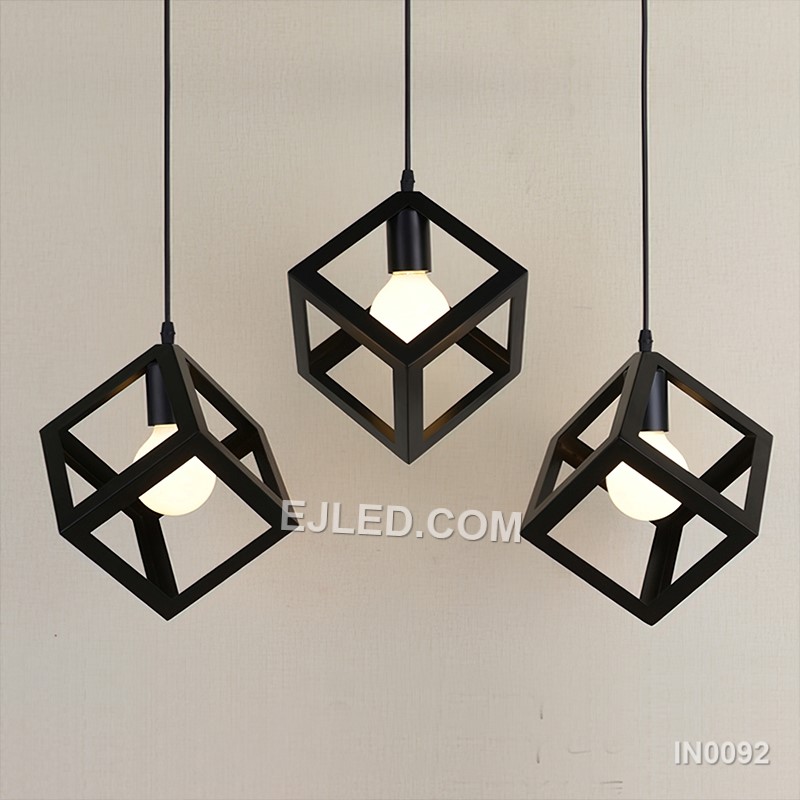 This single pendant light features an open cuboid shade crafted from light-coloured wooden slats, enclosing an inner clear glass cylinder. It offers diffused light and a natural aesthetic. - view 6
