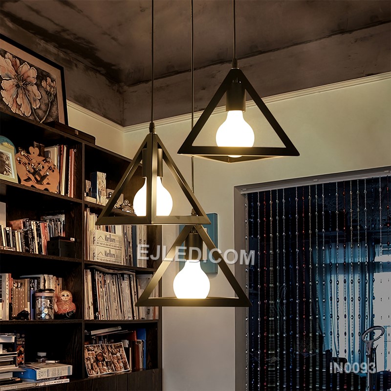 This single pendant light features a striking pyramid-shaped shade, crafted from black-finished metal with opaque sides that direct light downwards. It provides focused illumination for task areas. - view 6