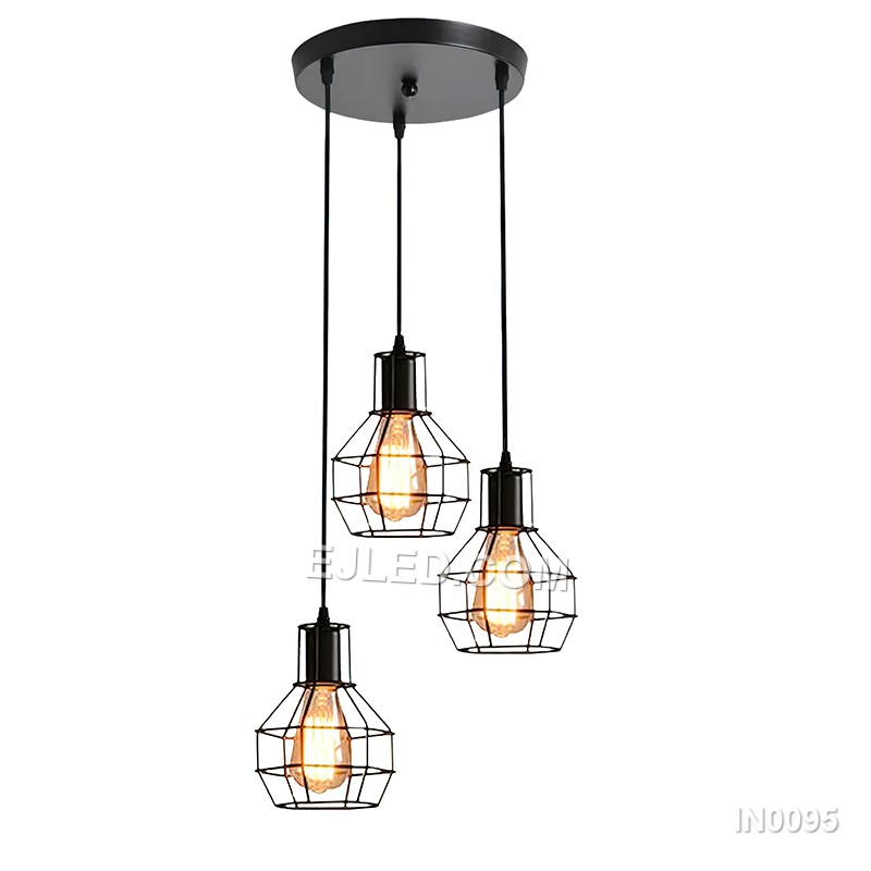 Statement lighting for dining areas or hotel lobbies, the IN0095 pendant light brings a unique blend of materials. An open square cage of black metal encloses an inner wooden frame, creating a rustic-industrial aesthetic with a single lamp inside. - view 2