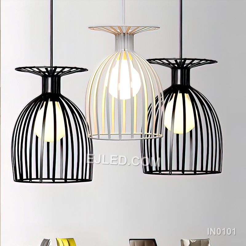 Black iron wire forms three open drum-shaped cages, each housing a single lamp. This multi-lamp pendant hangs from a round canopy, with cords of varying lengths creating a tiered, cluster arrangement. - view 4