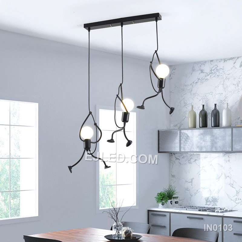 Suitable for adding character to stairwells, children's rooms, or creative hospitality settings, this fixture features three small, round black iron pendants. Playful human-like figures are integrated along each suspension cable, adding unique visual interest. - view 4