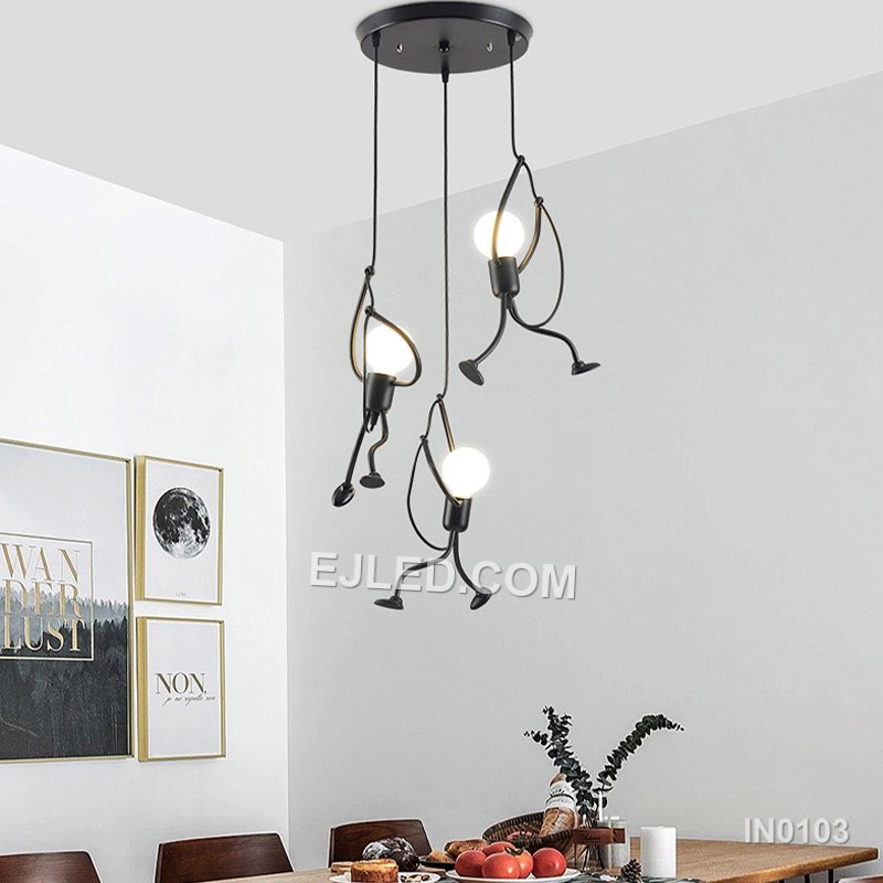 Suitable for adding character to stairwells, children's rooms, or creative hospitality settings, this fixture features three small, round black iron pendants. Playful human-like figures are integrated along each suspension cable, adding unique visual interest. - view 5