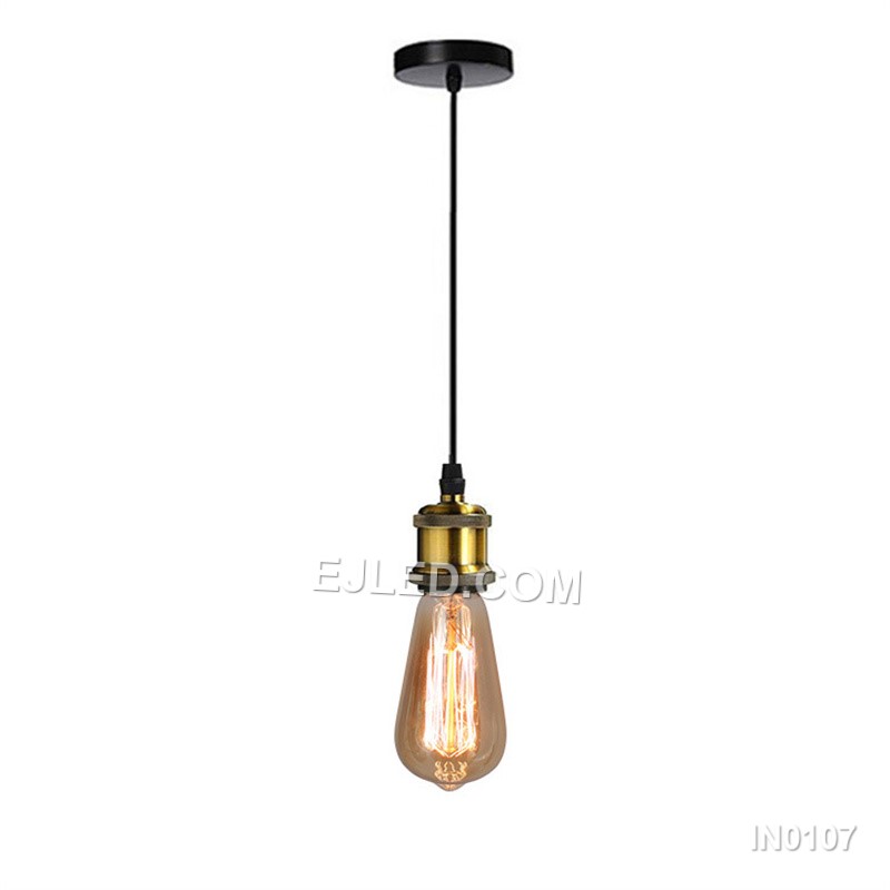Model IN0107 is a single-lamp pendant light featuring an angular, conical shade with an open base. Its reflective gold metallic finish and focused downlight are suspended by a contrasting black cord and canopy.