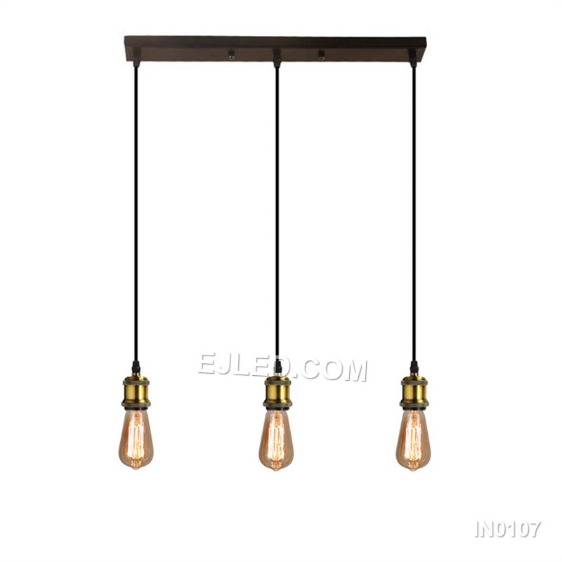 Model IN0107 is a single-lamp pendant light featuring an angular, conical shade with an open base. Its reflective gold metallic finish and focused downlight are suspended by a contrasting black cord and canopy. - view 2