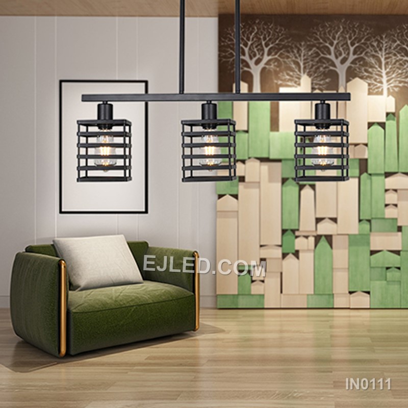 Over kitchen islands, dining tables, or in reception areas, the IN0111 pendant light provides focused illumination from three individual rectangular wire cages. Each black iron cage is open, allowing light to spread from the exposed bulbs within. - view 2