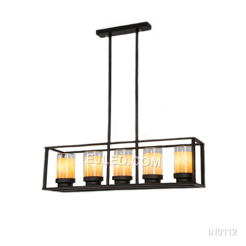 The IN0112 linear pendant light features a black steel frame enclosing five clear glass shades. Suspended by two cables, this fixture offers bright, focused illumination ideal for kitchen islands and long counters. - view 3
