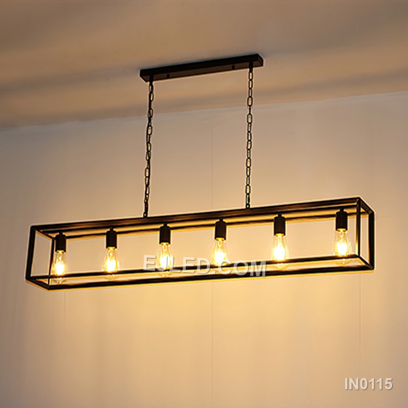 Black iron forms the open rectangular frame of this six-light pendant fixture, suspended by two adjustable chains. Its expansive shape makes it suitable for illuminating large dining tables or expansive kitchen islands. - view 3