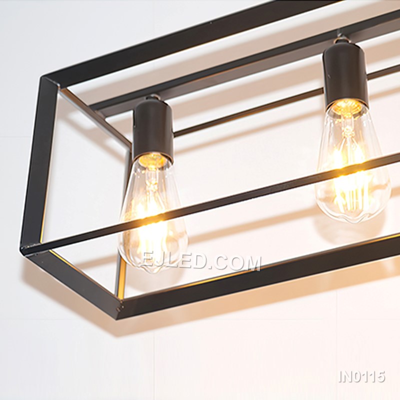 Black iron forms the open rectangular frame of this six-light pendant fixture, suspended by two adjustable chains. Its expansive shape makes it suitable for illuminating large dining tables or expansive kitchen islands. - view 6