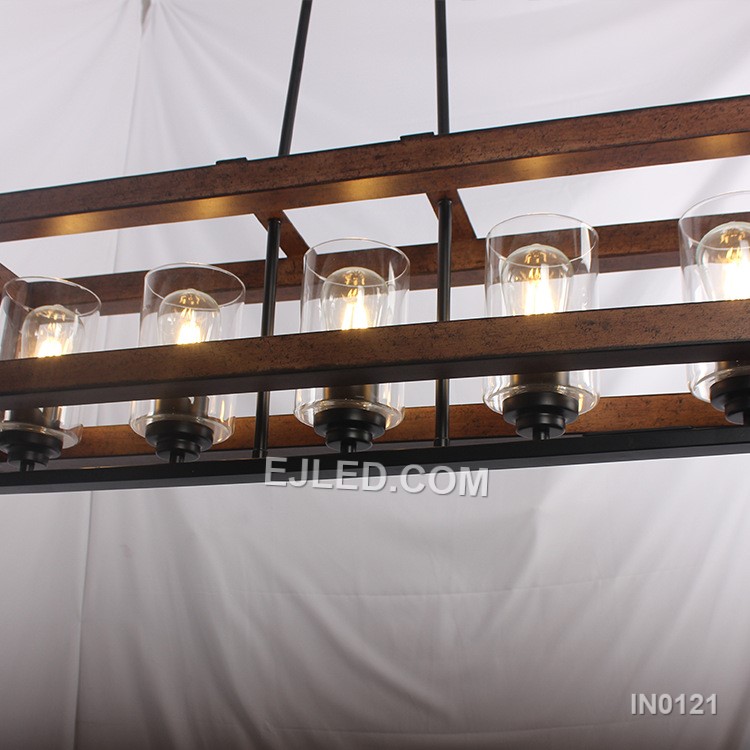 A wooden beam pendant light, the IN0121 integrates five clear glass candle-shaped shades for a warm, inviting glow. This fixture combines natural and industrial elements. - view 3