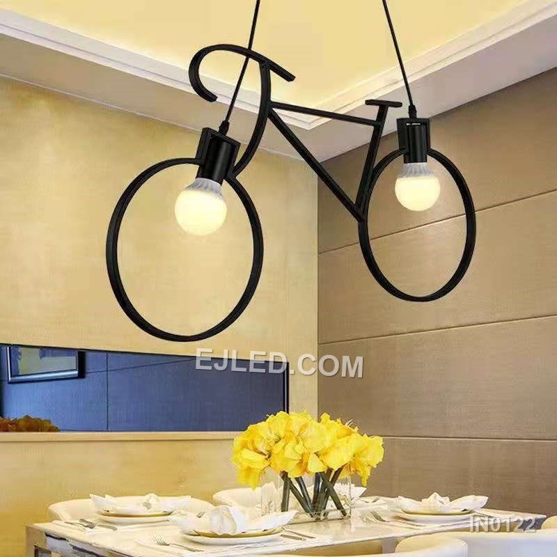 An iron pendant light, the IN0122 features a distinctive bicycle-frame design in black. It holds two exposed lamps, offering playful and direct illumination. - view 4