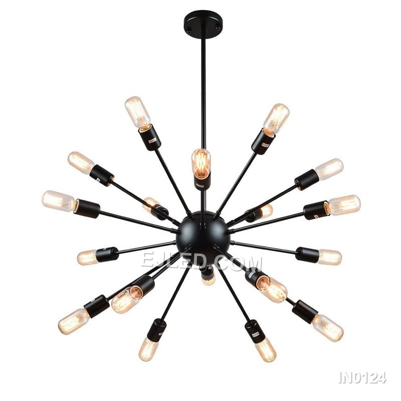 A sputnik pendant light, the IN0124 features a black steel body with six radiating arms. Each lamp holder is accented with a gold-toned collar, offering exposed, multi-directional illumination. It suspends from a matching black ceiling canopy.
