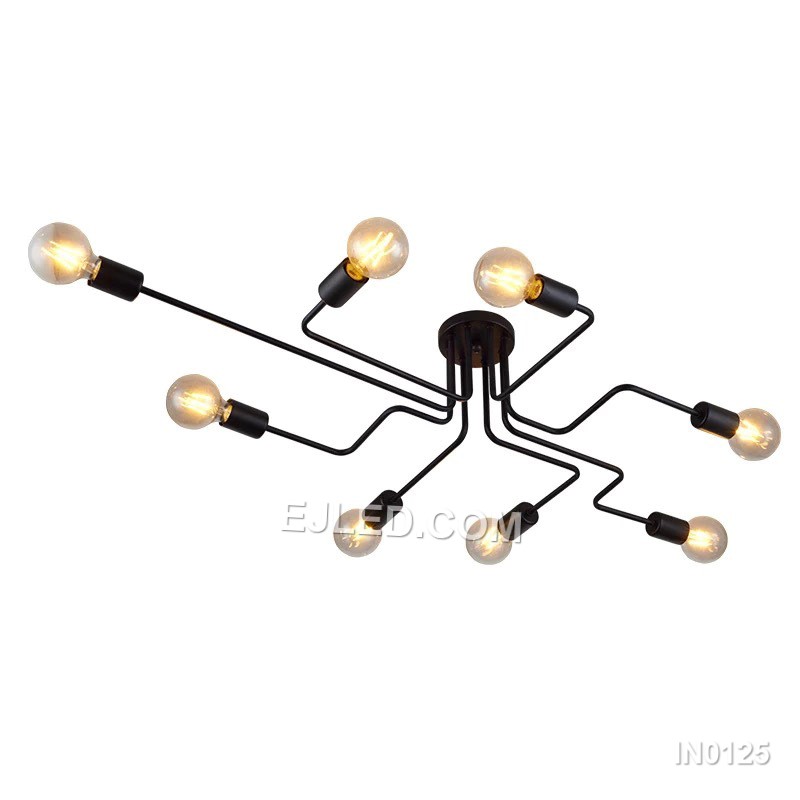 Finished in matte black steel, this close-to-ceiling sputnik fixture offers eight exposed lamp holders on radiating arms. Gold-toned accents at each socket provide visual contrast, making it suitable for spaces needing broad, unshaded illumination without a long drop.