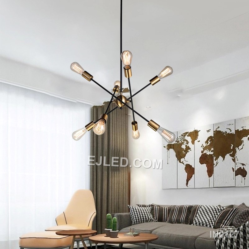 Featuring a brass construction, this 8-lamp sputnik pendant light radiates arms from a central sphere. Black-toned collars at each lamp holder and a matching ceiling rose provide contrast. Suspended by a rigid rod, it offers an unshaded, multi-directional light source. - view 2