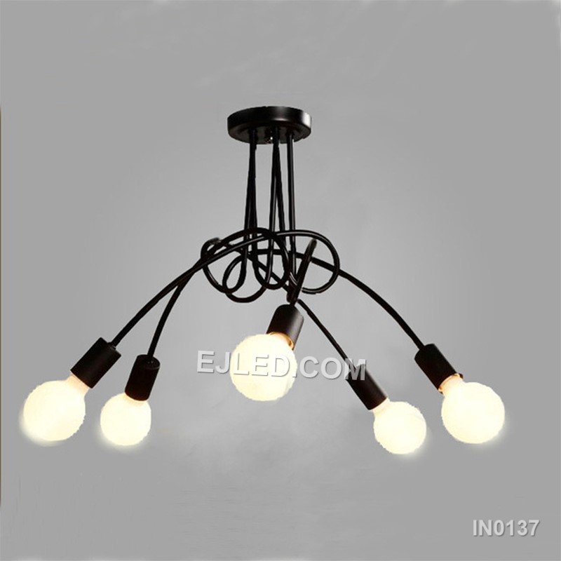 In contemporary dining areas or entryways, the IN0137 pendant presents five opaque white glass globes. These are mounted on brass arms radiating from a central white downrod, creating a balanced, multi-directional light source. - view 2