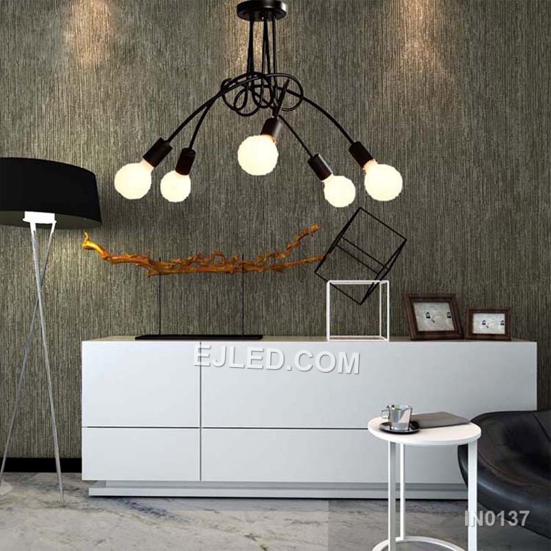 In contemporary dining areas or entryways, the IN0137 pendant presents five opaque white glass globes. These are mounted on brass arms radiating from a central white downrod, creating a balanced, multi-directional light source. - view 3