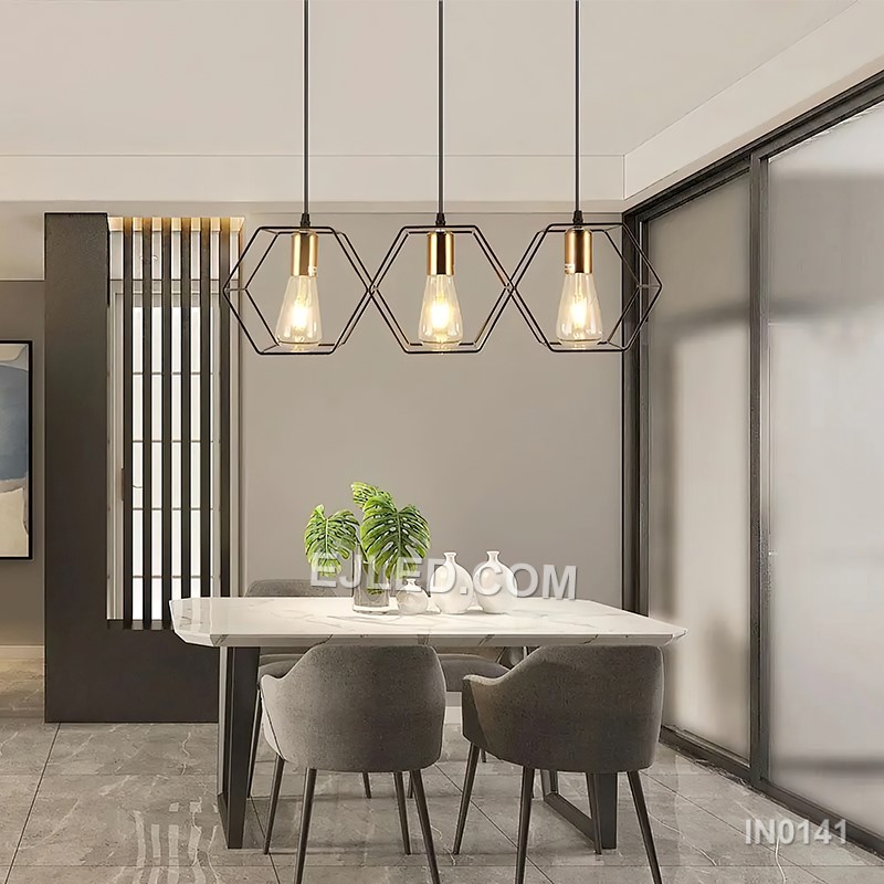 A rectangular black-finished brass frame defines the IN0141, a linear pendant light. It houses five lamps, each with a contrasting gold-finished accent, making it suitable for illuminating kitchen islands or dining tables in medium-sized rooms. - view 4