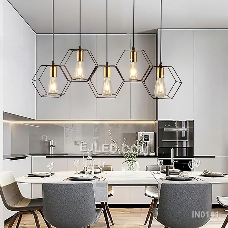 A rectangular black-finished brass frame defines the IN0141, a linear pendant light. It houses five lamps, each with a contrasting gold-finished accent, making it suitable for illuminating kitchen islands or dining tables in medium-sized rooms. - view 5