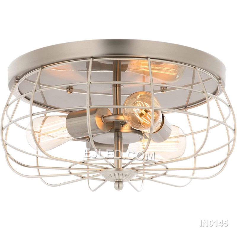 Iron craftsmanship shapes the IN0145, a semi-flush pendant light with a round, open-cage drum shade in matte black. Five exposed lamps within the frame allow for decorative bulb choices, creating a warm, ambient light that casts subtle patterns. - view 3