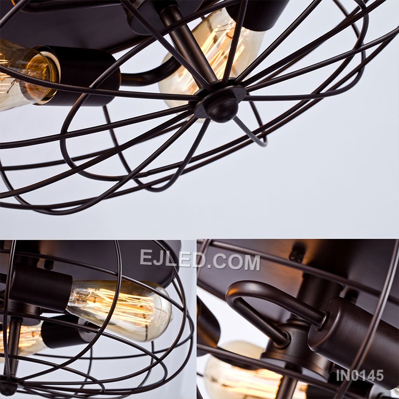 Iron craftsmanship shapes the IN0145, a semi-flush pendant light with a round, open-cage drum shade in matte black. Five exposed lamps within the frame allow for decorative bulb choices, creating a warm, ambient light that casts subtle patterns. - view 6