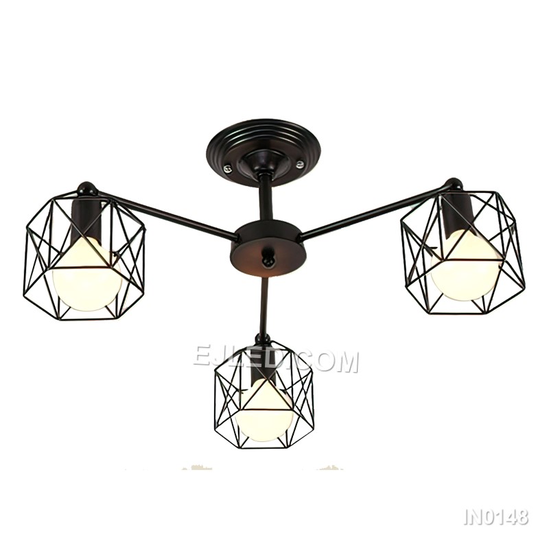 Three iron pendants form the clustered IN0148 fixture, each featuring an open conical wire cage in a black finish. Suspended at varying heights, they offer broad illumination and a distinct silhouette suitable for focused task lighting or ambient glow.