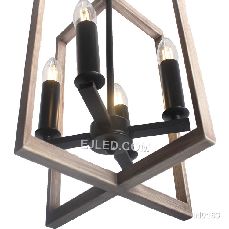 The IN0169 is a linear pendant light featuring two round, open cage shades. Each shade combines black iron with internal wood grain accents and houses two lamps, creating a four-lamp fixture suitable for kitchen islands or dining areas.