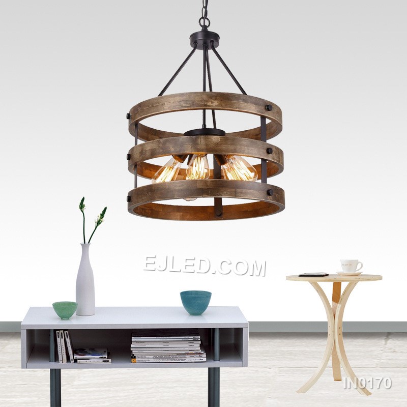 This cluster pendant, model IN0170, offers focused downward illumination. Three black dome shades, each with a contrasting interior, are suspended at varying heights, directing light without significant glare when paired with appropriate bulbs. - view 2