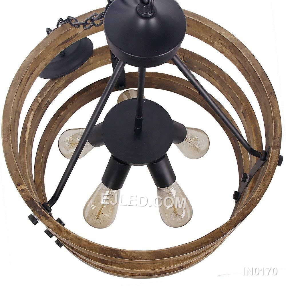 This cluster pendant, model IN0170, offers focused downward illumination. Three black dome shades, each with a contrasting interior, are suspended at varying heights, directing light without significant glare when paired with appropriate bulbs. - view 3