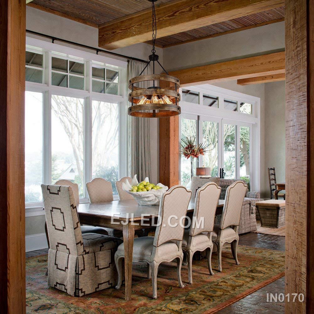 This cluster pendant, model IN0170, offers focused downward illumination. Three black dome shades, each with a contrasting interior, are suspended at varying heights, directing light without significant glare when paired with appropriate bulbs. - view 4