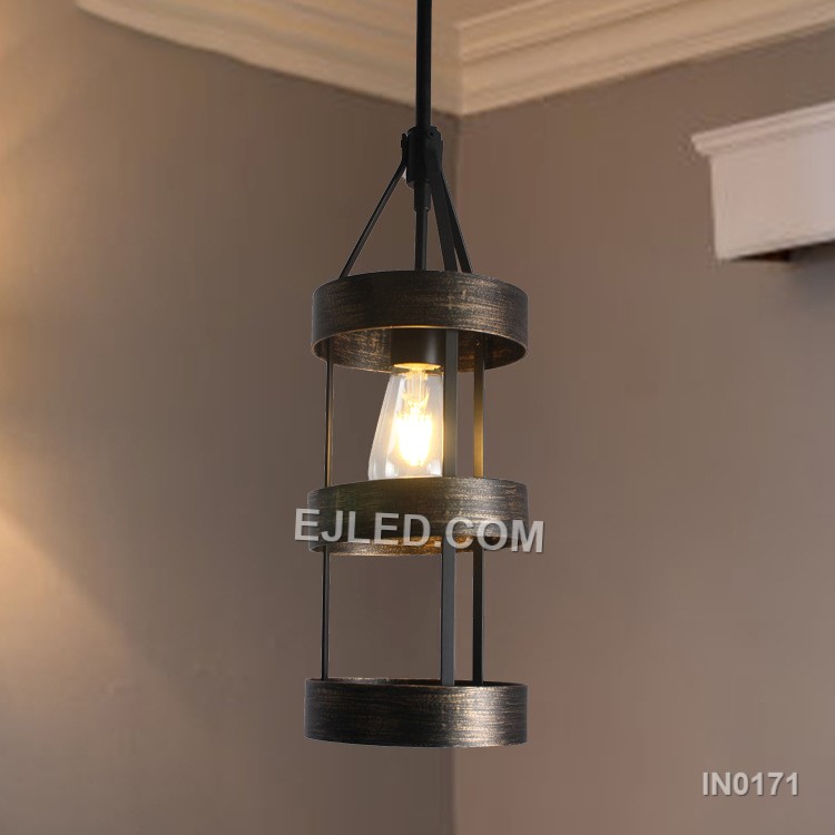 Iron construction defines the IN0171, an open square cage pendant. Its black finish is complemented by interior wood grain accents on specific panels, providing a warm visual contrast. This single-lamp fixture offers widespread ambient light.