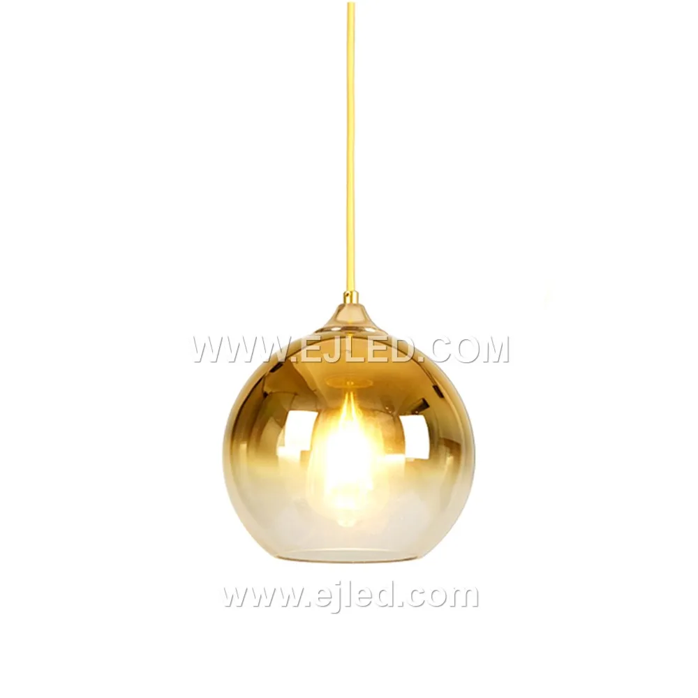 Model GL0002 is a single-lamp pendant featuring a large, clear spherical glass shade of 20cm diameter, suitable for creating a bright, open feel. Its golden-brushed brass finish suspension provides a refined contrast to the transparent globe. - view 4