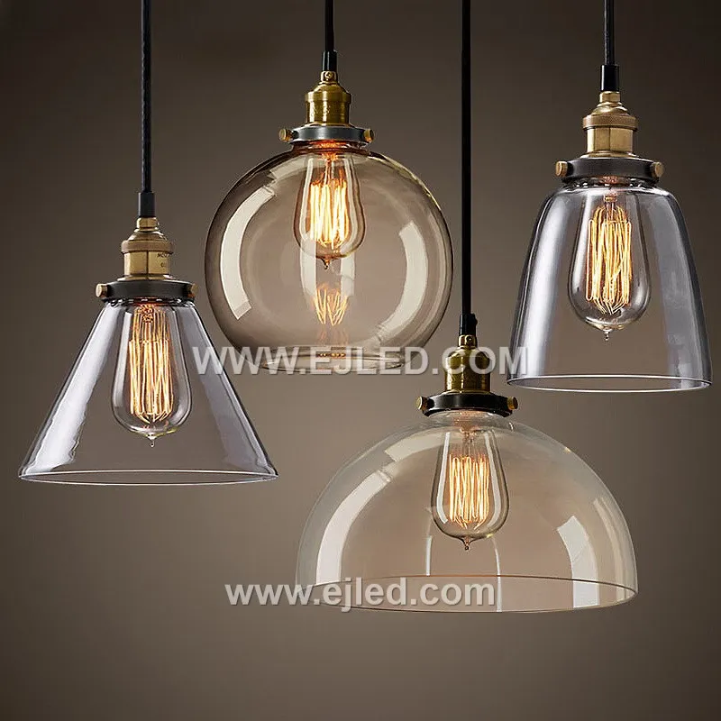 Model GL0016 features a clear, slightly flattened spherical glass shade with a wide bottom opening, accented by a substantial polished brass top. Its compact size and open design make it suitable for focused task lighting or as an accent in smaller spaces. - view 3