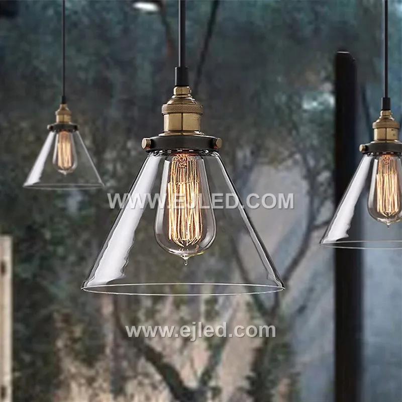 Model GL0016 features a clear, slightly flattened spherical glass shade with a wide bottom opening, accented by a substantial polished brass top. Its compact size and open design make it suitable for focused task lighting or as an accent in smaller spaces. - view 4