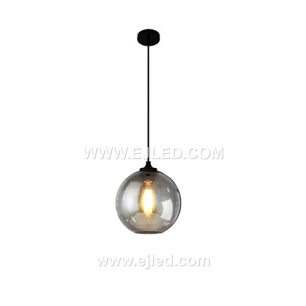 This dome-shaped glass pendant light, model GL0017, features a smoked grey finish that transitions from opaque at the top to clear at the bottom. This design effectively directs light downwards, reducing glare while highlighting the bulb within. - view 5